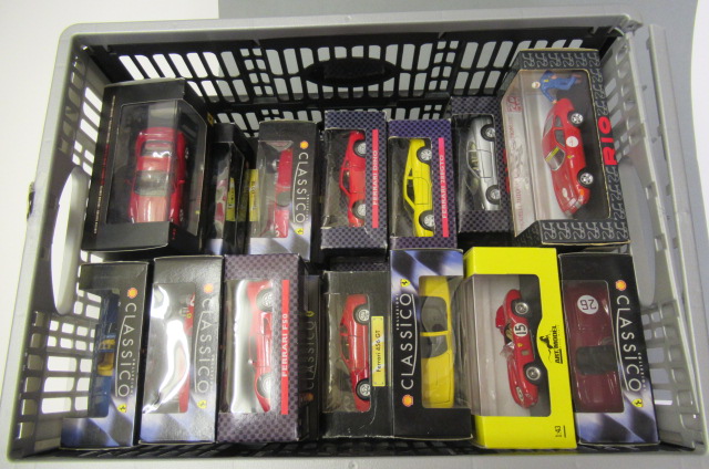 Thirty five 1:43 scale Ferrari models by Classico Image