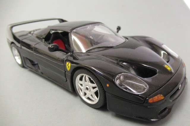 Unboxed large scale cars by Burago including Ferrari Image