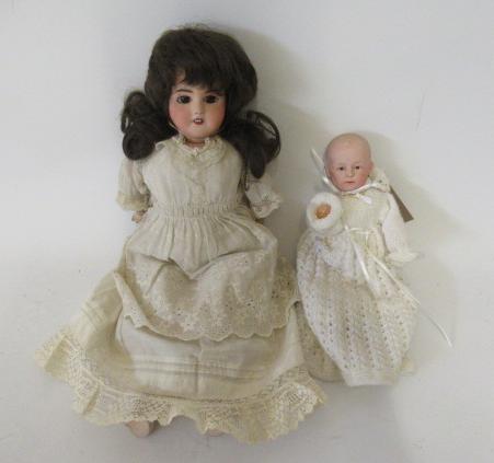 Two bisque socket head dolls Image