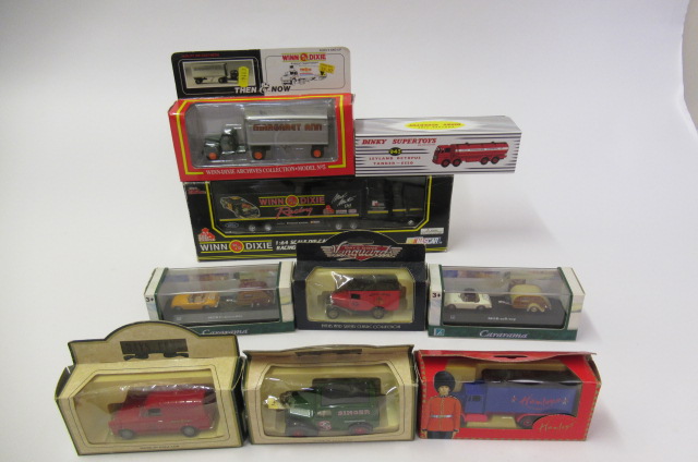 Thirteen diecast vehicles by Lledo and others including Days Gone and Atlas Dinky tanker Image