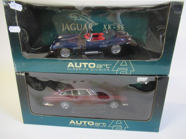 Auto Art 1:18 scale DB5 in maroon and 1:18 scale Jaguar XKSS Image