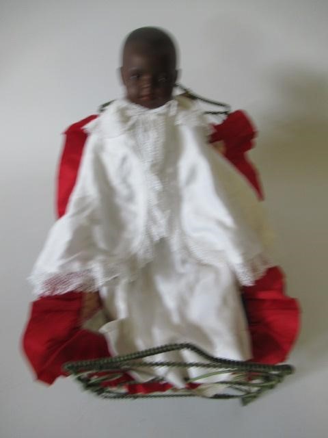 A Heubach Koppelsdorf black baby doll Image