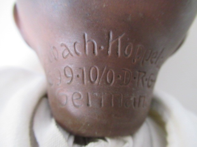 A Heubach Koppelsdorf black baby doll Image