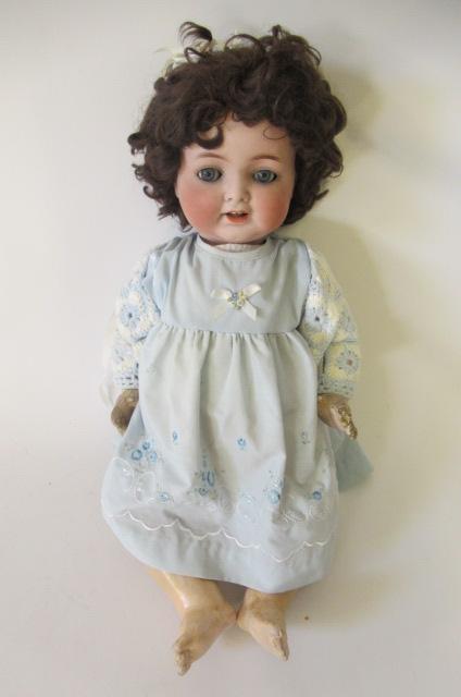 A Heubach Koppelsdorf bisque socket head flirty doll Image