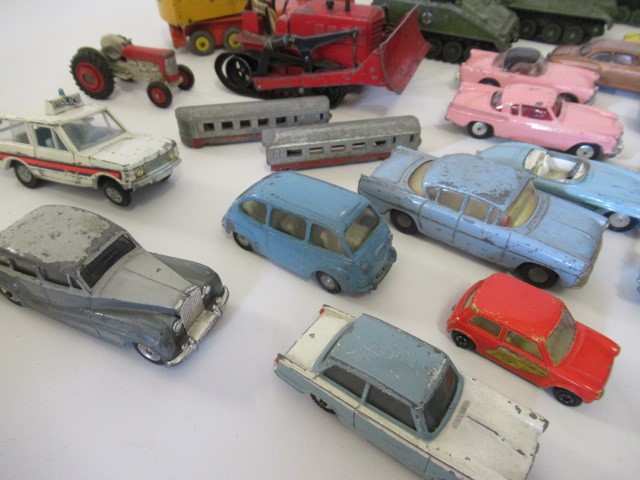 Playworn diecast vehicles including Corgi Image
