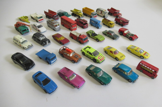 Unboxed Matchbox vehicles including cars Image