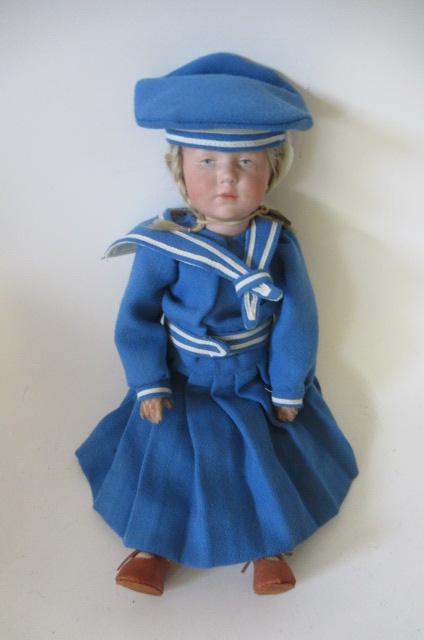 A Kammer & Reinhardt bisque socket head solemn girl Image