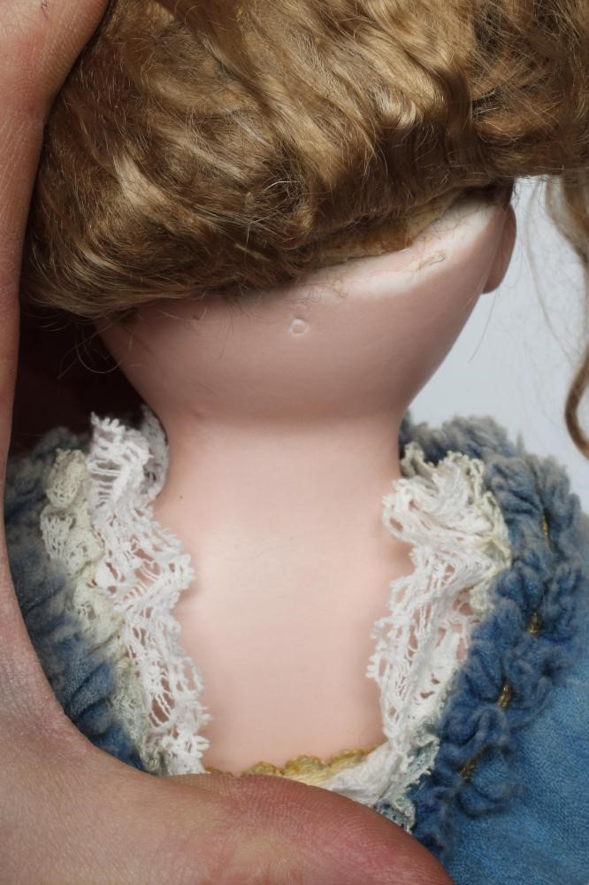 A Kestner bisque shoulder head doll Image