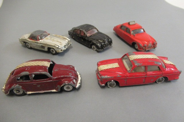 Playworn Dinky toys including cars Image