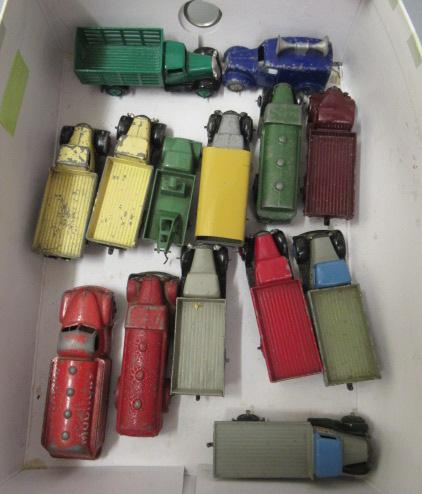 Fourteen unboxed early Dinky trucks and van including petrol tankers Image