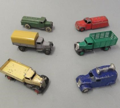 Fourteen unboxed early Dinky trucks and van including petrol tankers Image