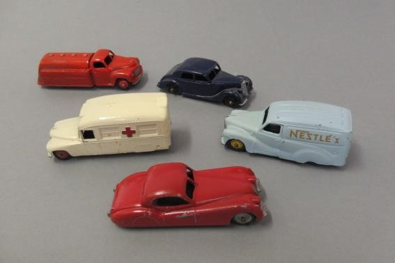 Twenty early Dinky vehicles including saloon cars Image