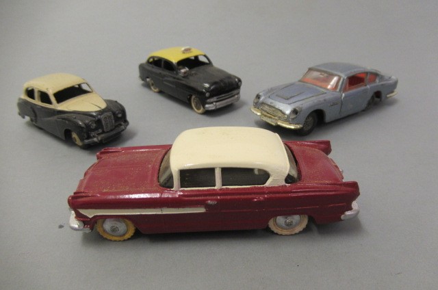 Twenty Dinky vehicles including British and American saloon cars Image