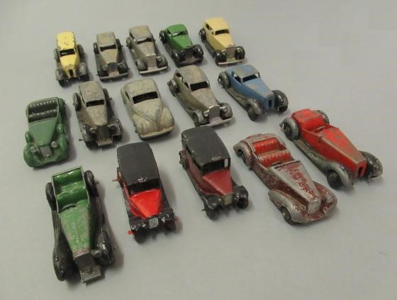Fifteen playworn early Dinky saloon cars Image