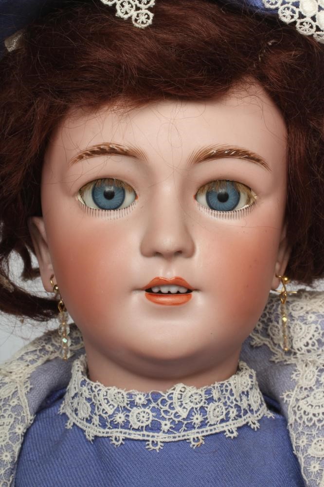 A Simon & Halbig bisque socket head doll Image