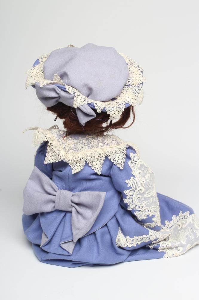 A Simon & Halbig bisque socket head doll Image