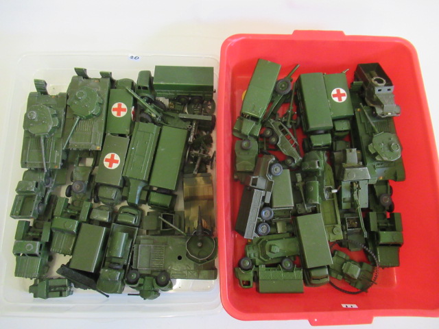 Unboxed army vehicles including tanks and transporters Image