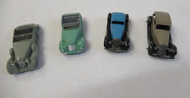 Four early Dinky saloons Image