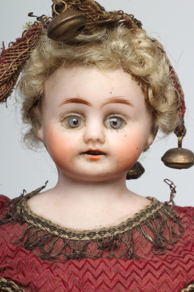 A bisque shoulder head musical marotte doll Image