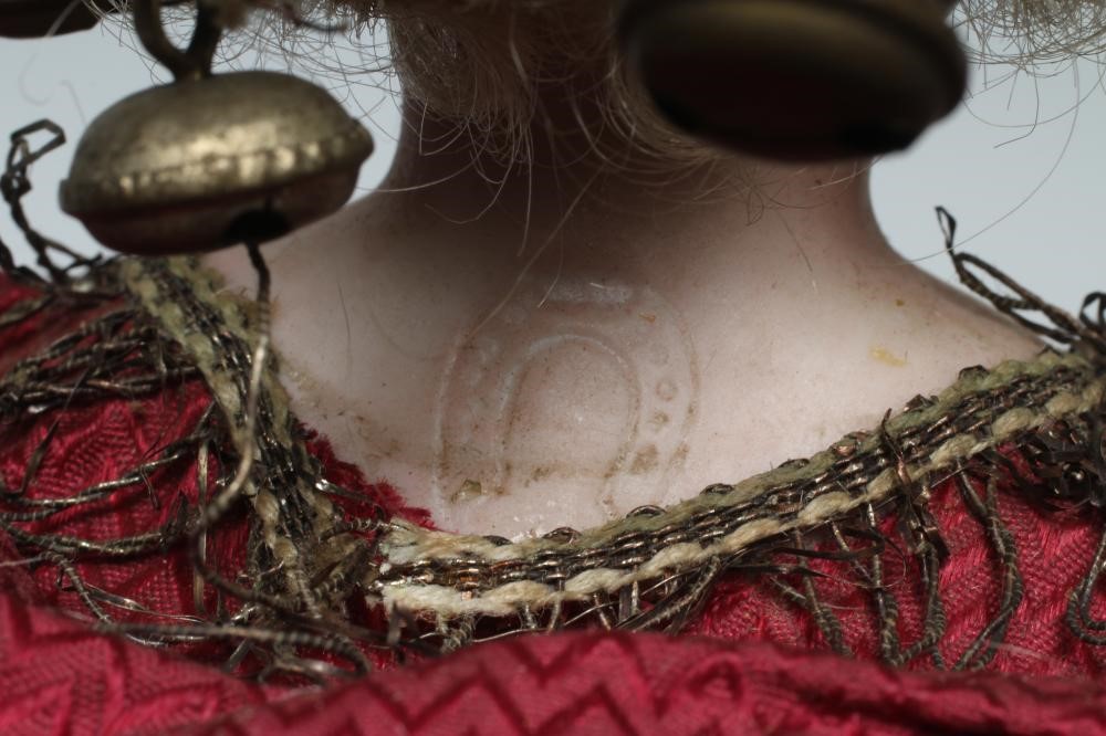 A bisque shoulder head musical marotte doll Image