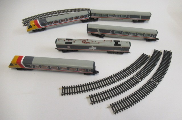 Hornby A.P.T. with two centre cars Image