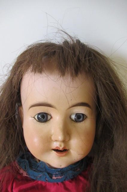 Two German bisque socket head dolls Image