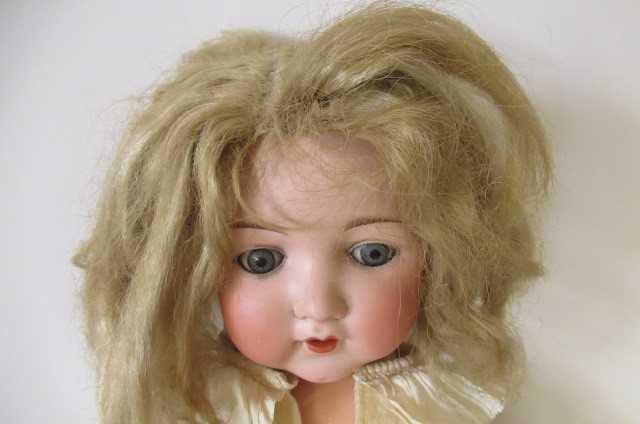 Two German bisque socket head dolls Image