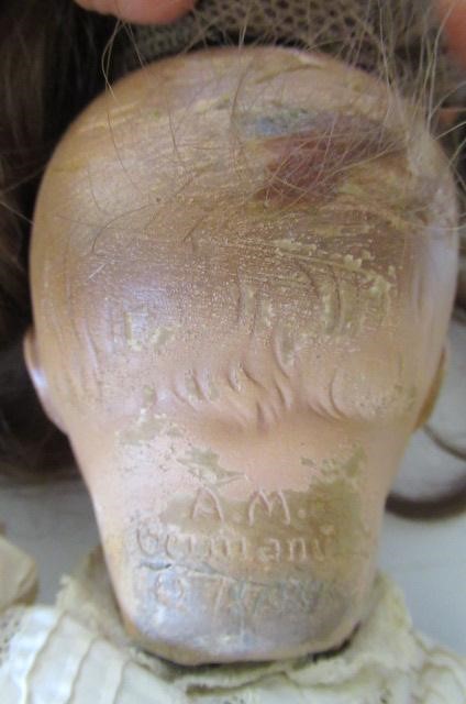 Seven composition dolls Image