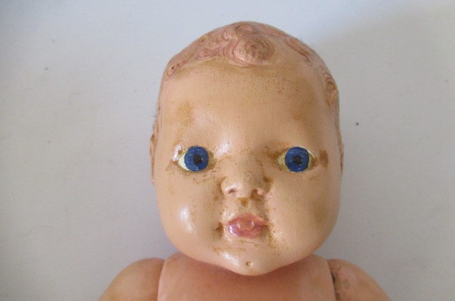 Seven composition dolls Image