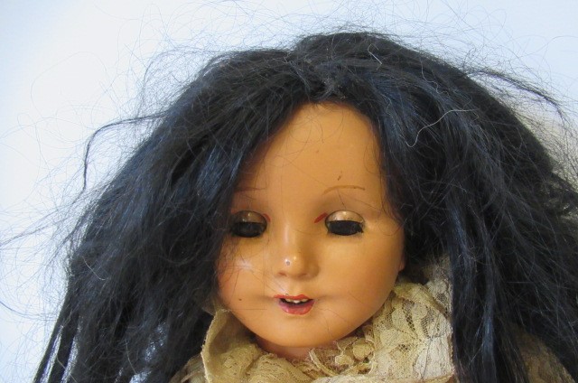 Seven composition dolls Image