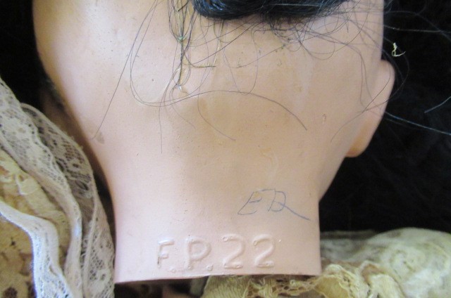 Seven composition dolls Image