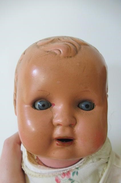 Seven composition dolls Image