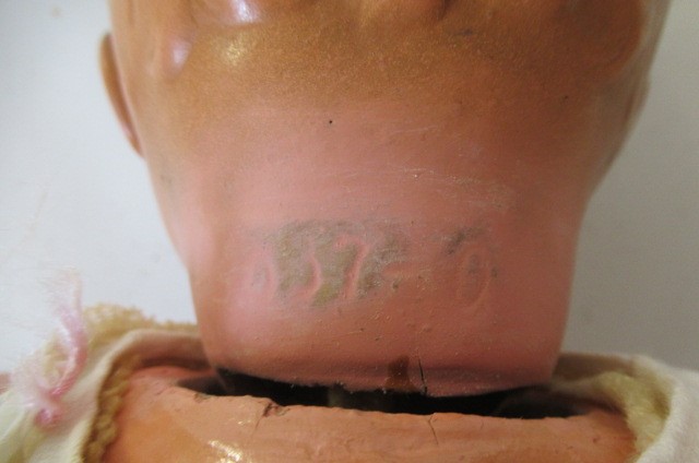 Seven composition dolls Image