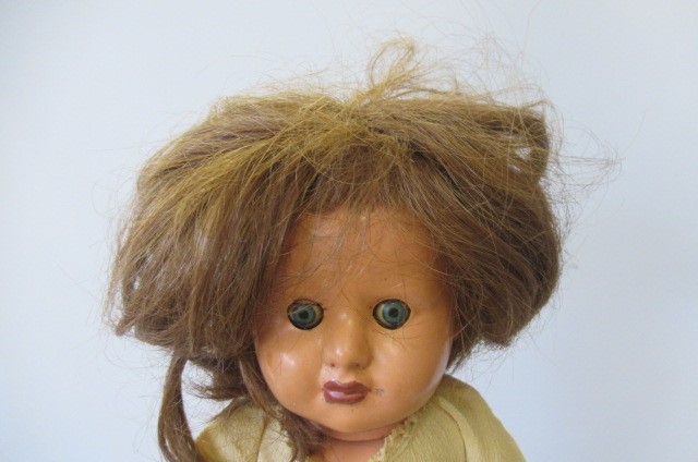 Seven composition dolls Image