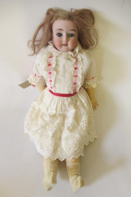 A Simon & Halbig bisque socket head doll Image