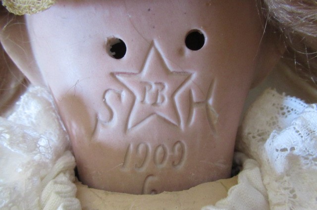 A Simon & Halbig bisque socket head doll Image