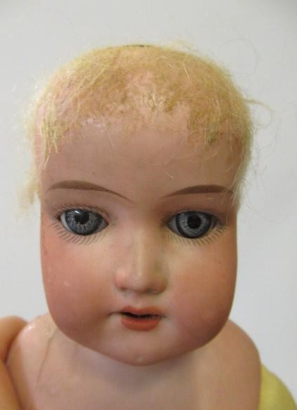 Two Armand Marseille bisque shoulder head dolls Image