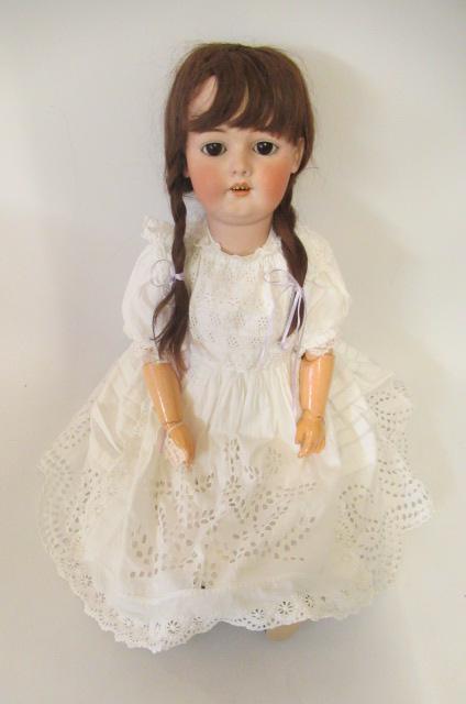 A Simon & Halbig bisque socket head doll Image