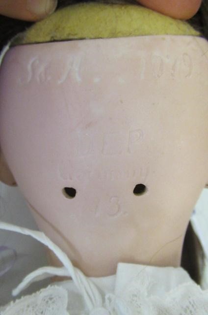A Simon & Halbig bisque socket head doll Image