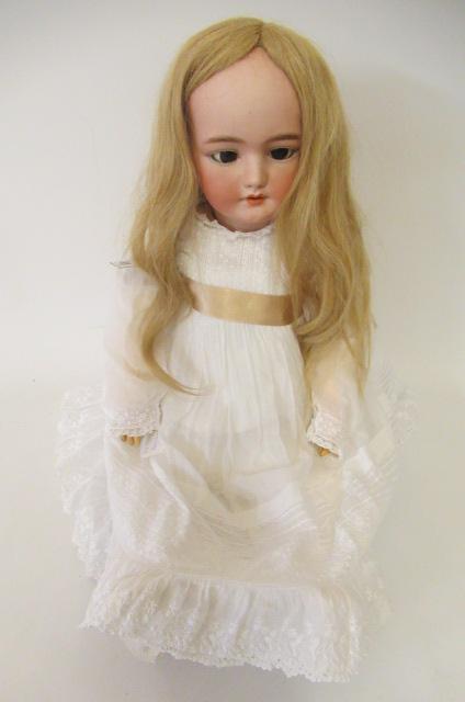 A Simon & Halbig bisque socket head doll Image