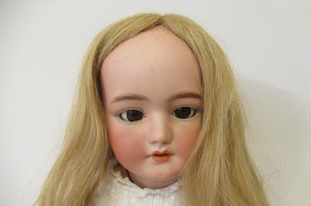 A Simon & Halbig bisque socket head doll Image