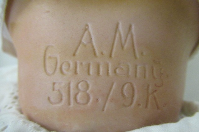 An Armand Marseille bisque socket head doll Image