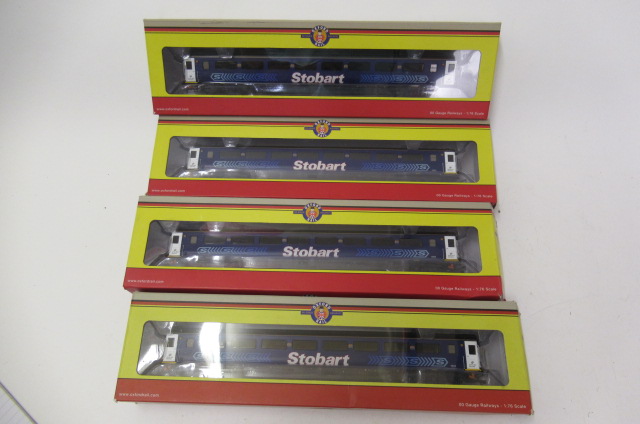 Four Oxford Rail Stobart coaches Image