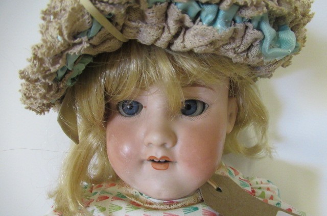 An Armand Marseille bisque socket head doll Image