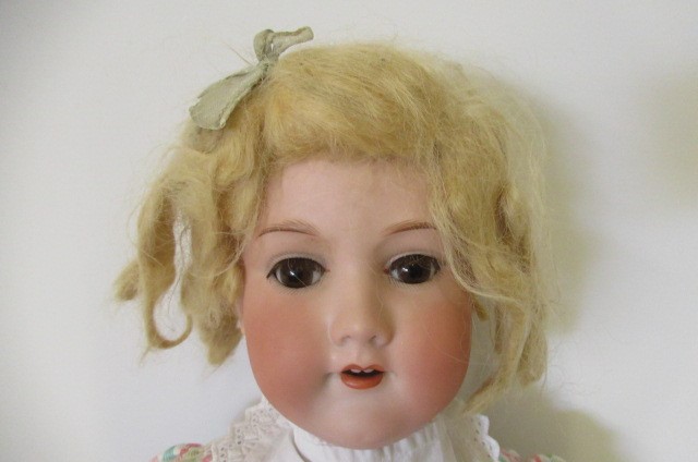 An Armand Marseille bisque socket head doll Image