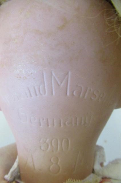 An Armand Marseille bisque socket head doll Image