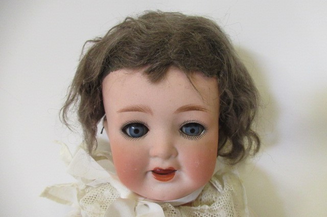 A Heubach Koppelsdorf bisque socket head doll Image