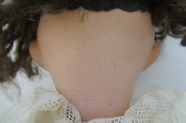 A Heubach Koppelsdorf bisque socket head doll Image