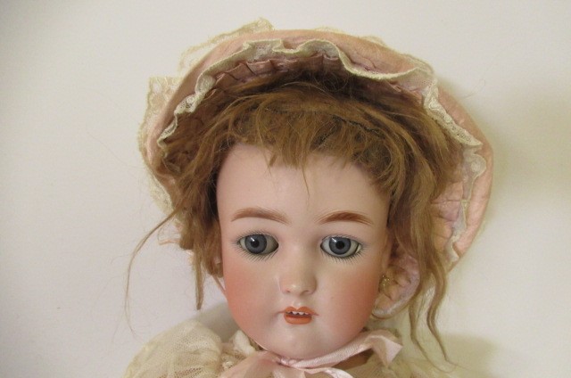 A Simon & Halbig bisque socket head doll Image