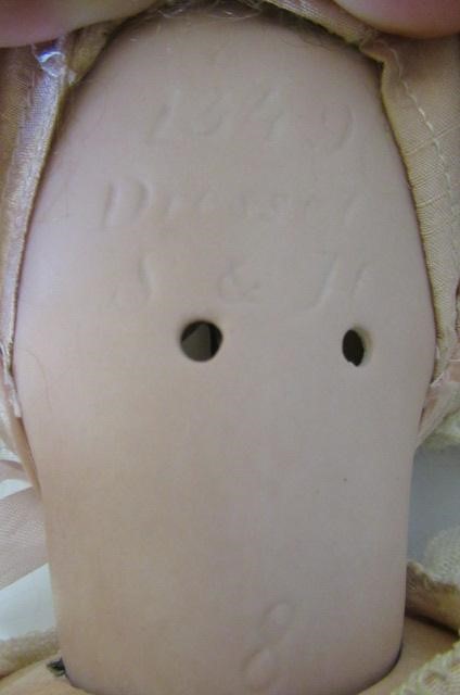 A Simon & Halbig bisque socket head doll Image